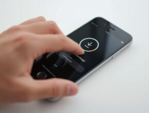 A close-up of a person's finger touching an iPhone screen that displays a download progress circle with a downward arrow icon, and a prominent "Canceled" label. This directly illustrates "How to Cancel Download on iPhone."