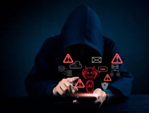 A smartphone showing a warning icon with fake app alert on screen